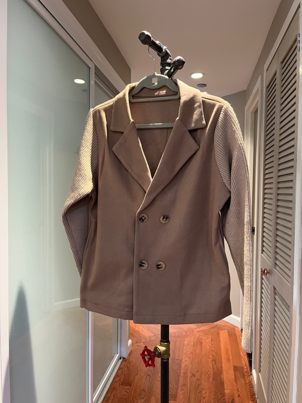 Womanโs Double-Breasted Brown Knit-Sleeve Jacket